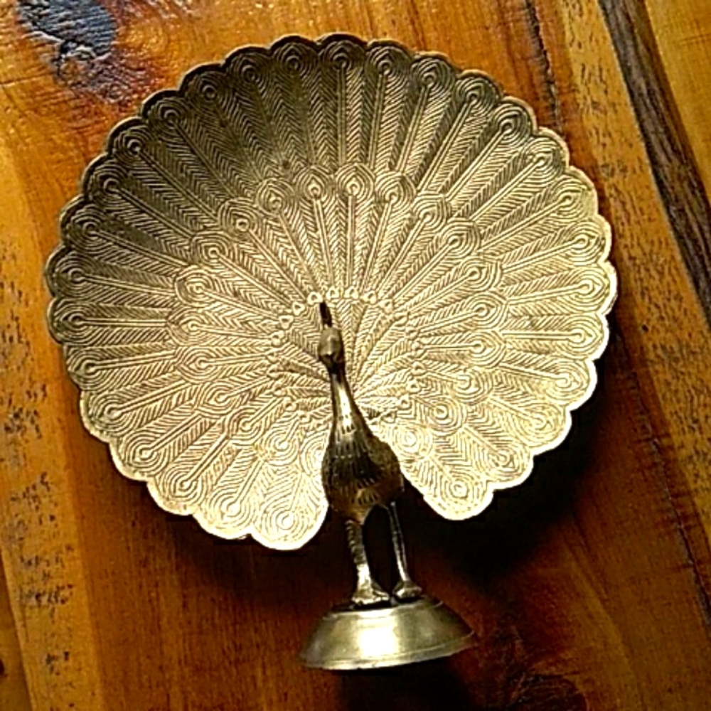 Brass peacock.